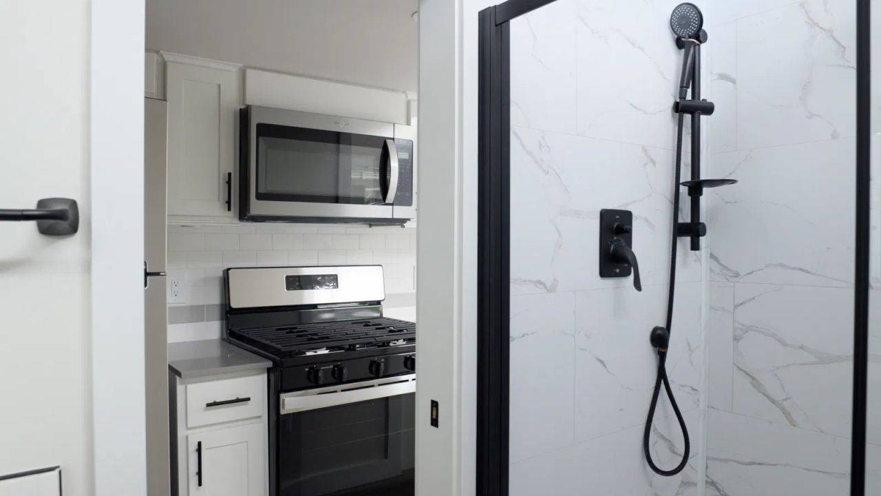 Bathroom and Kitchen of Farmhouse Chalet tiny house