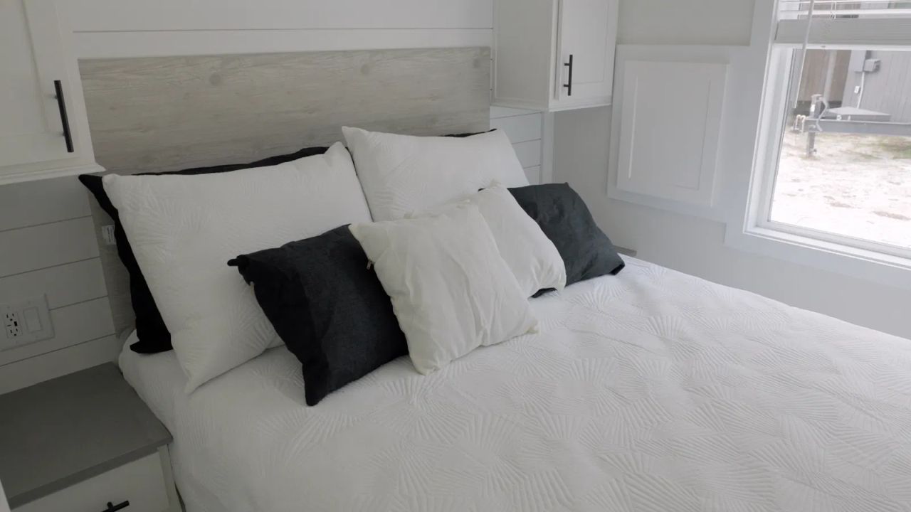 Downstairs Bedroom of Farmhouse Chalet tiny house - 2