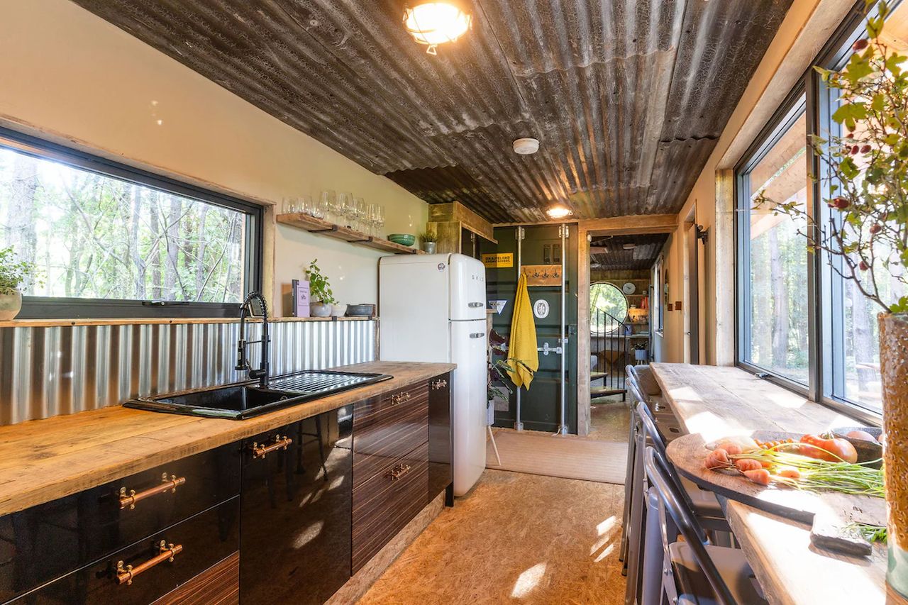 Kitchen of Evergreen Cabin- Shipping Container Home