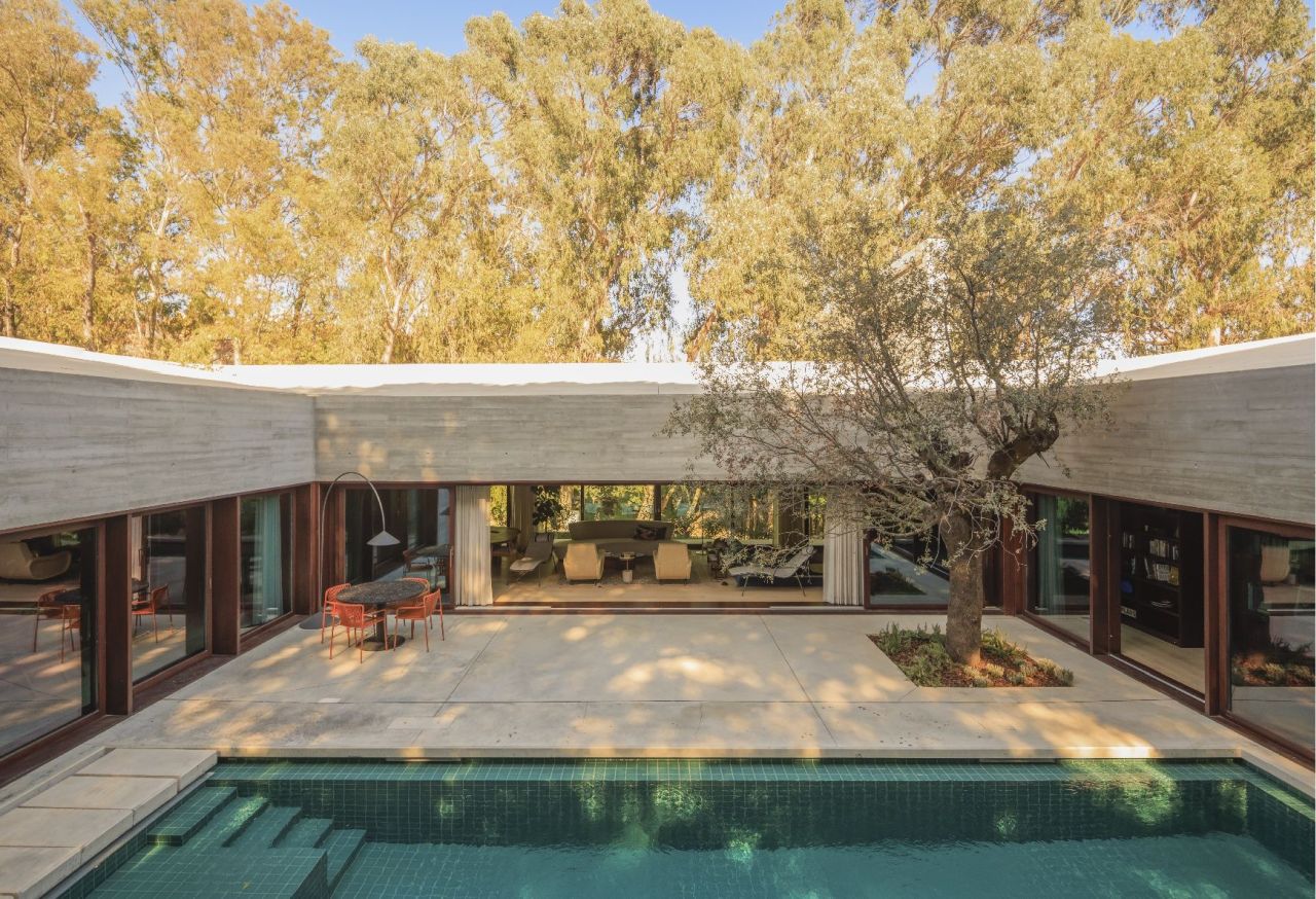 U-Shaped Residence in Portugal is Partially Buried Into Ground