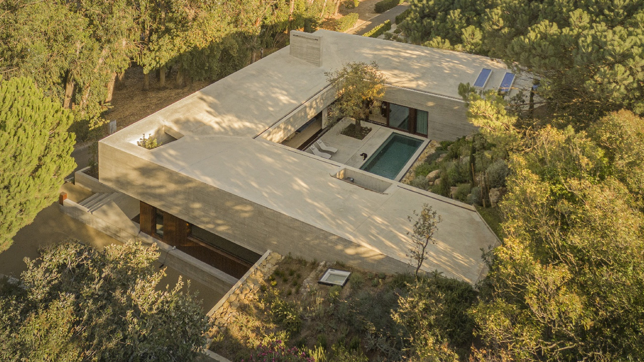 U-Shaped Residence in Portugal is Partially Buried Into Ground