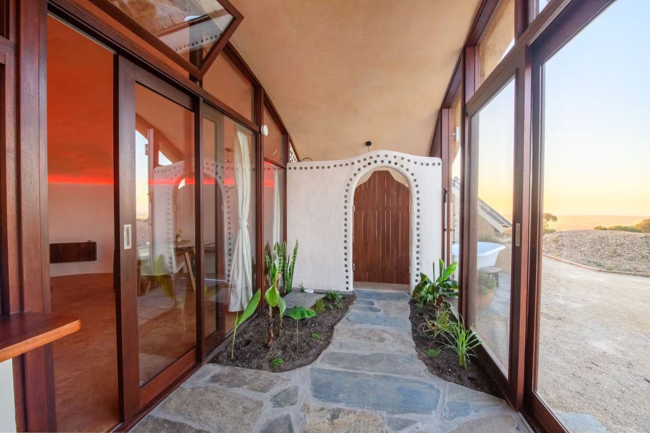 This Earthship Tiny Home in Australia is Bushfire Resilient