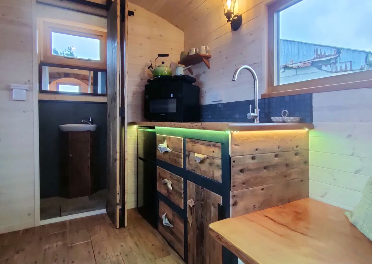 1940s Rail Carriage Turned Into Quaint Tiny Home - kitchenette