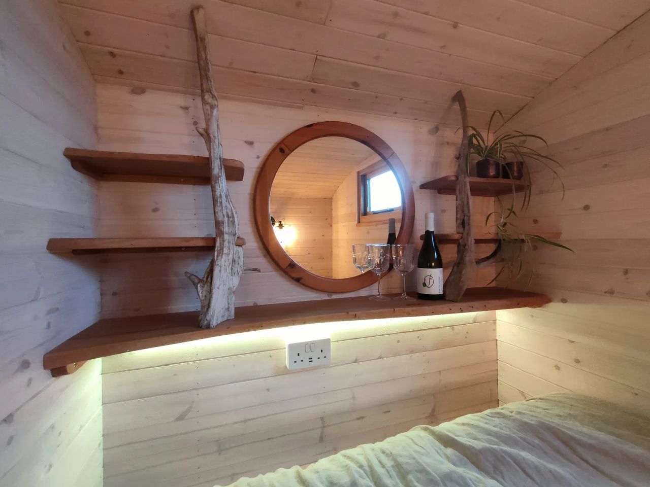 1940s Rail Carriage Turned Into Quaint Tiny Home - window bedroom 2