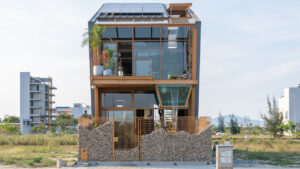 Ga.o House by 85 Design in Hòa Hảiin Vietnam Features Waterfall and Pool for Microclimate