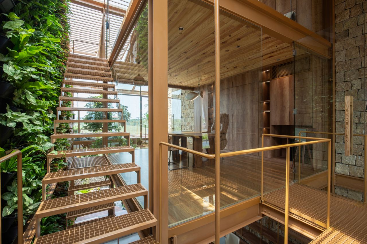 Ga.o House by 85 Design in Hòa Hảiin Vietnam Features Waterfall and Pool for Microclimate