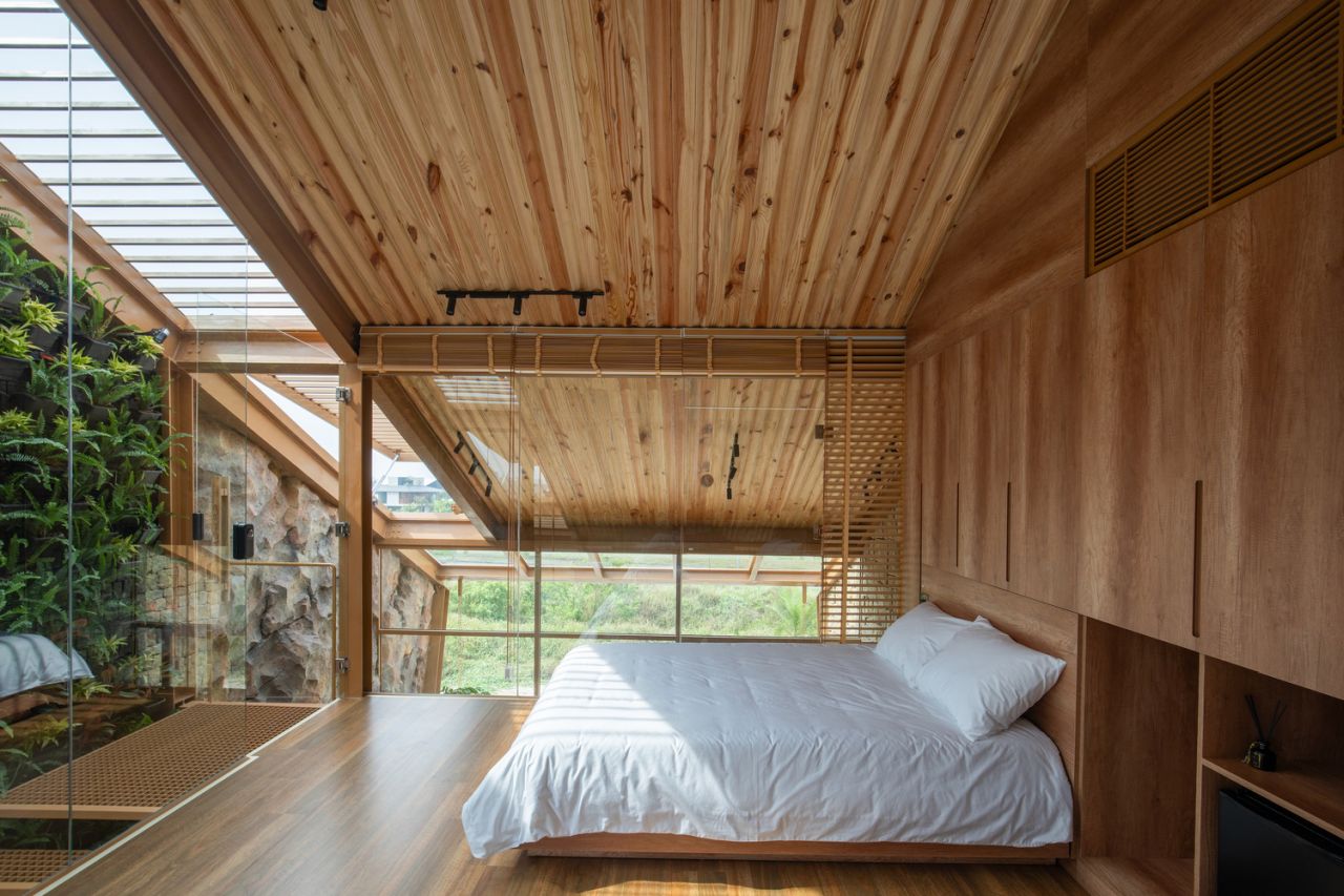 Ga.o House by 85 Design in Hòa Hảiin Vietnam Features Waterfall and Pool for Microclimate