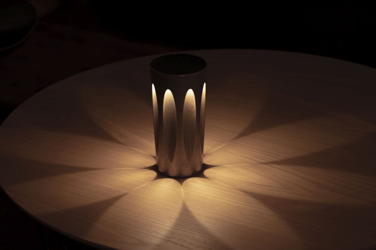 Patryk Koca Designs Bronze Lamp That Doesn’t Look Like a Lamp Until Switched On
