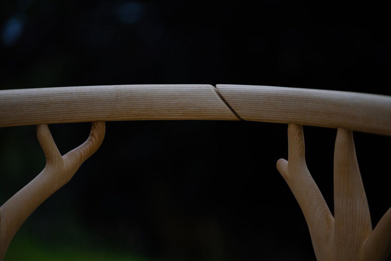 The Marchmont Workshop Canopy Chair Features Hand-Woven Rush Seat and Antler-Shaped Backrest