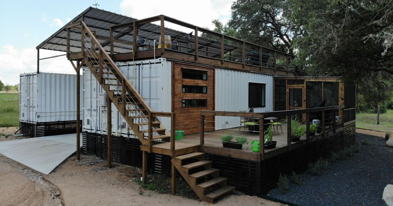 This Tiny House Made From Three Shipping Containers Features Two Decks and a Covered Patio