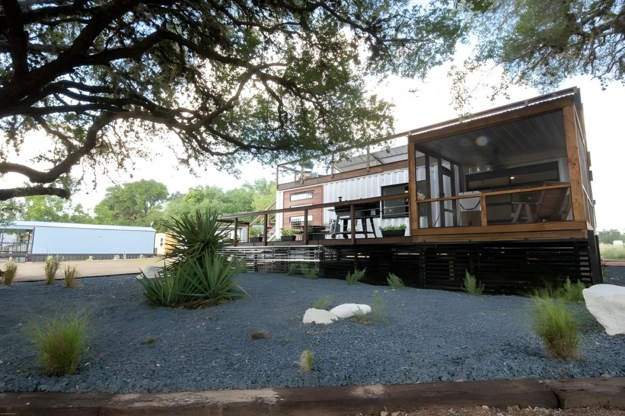This Tiny House Made From Three Shipping Containers Features Two Decks and a Covered Patio