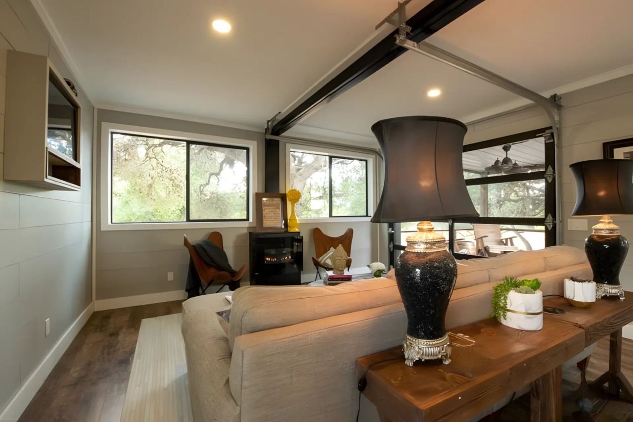 This Tiny House Made From Three Shipping Containers Features Two Decks and a Covered Patio