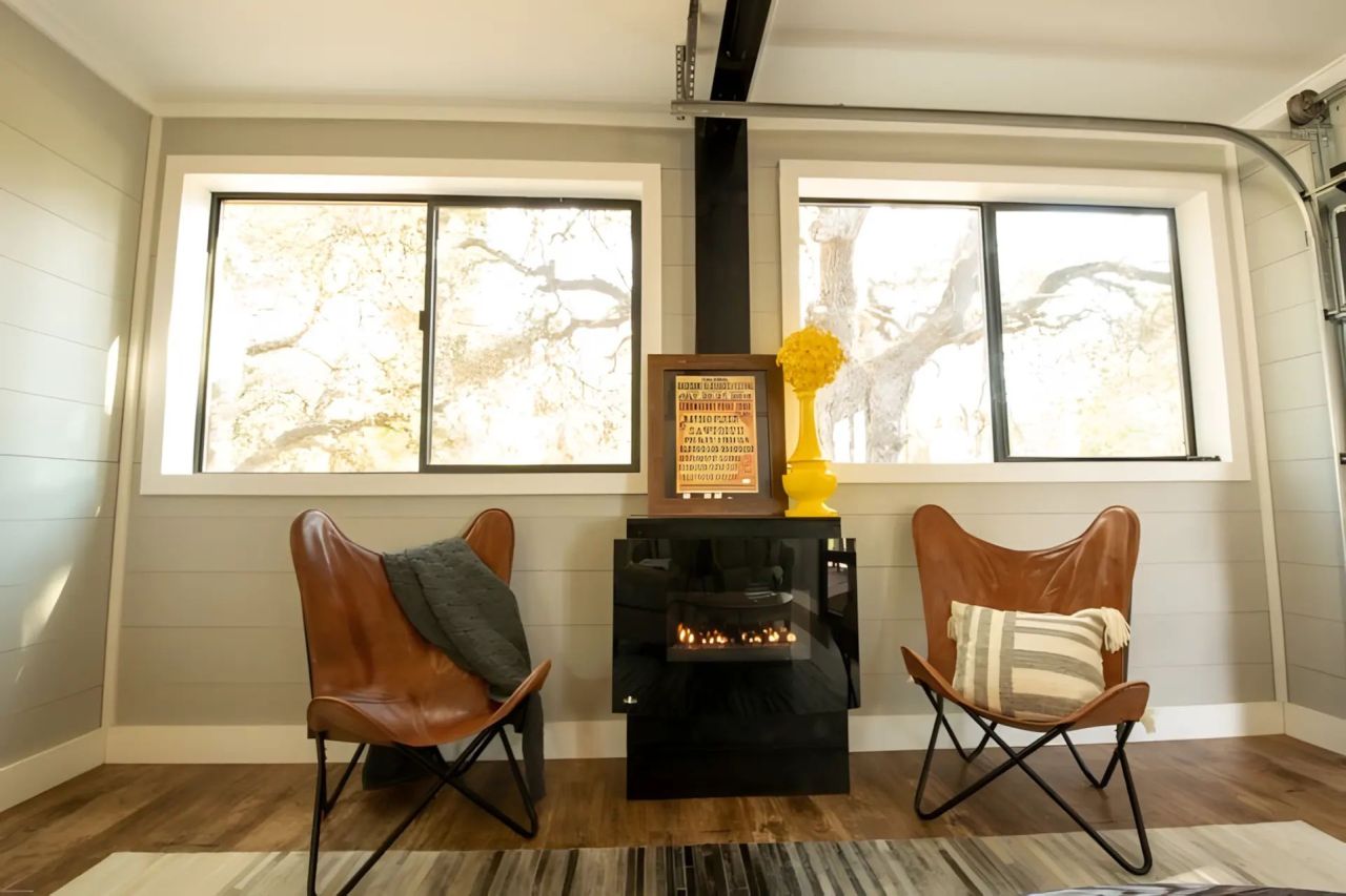 This Tiny House Made From Three Shipping Containers Features Two Decks and a Covered Patio