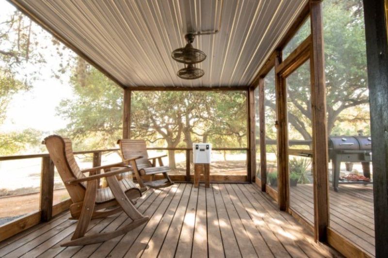 This Tiny House Made From Three Shipping Containers Features Two Decks and a Covered Patio