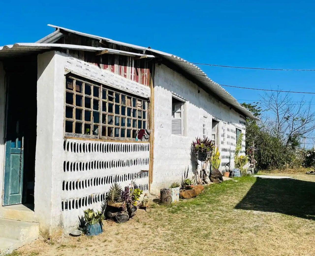 Brazilian Mother and Daughter Builds Airbnb Rental From 8,000 Recycled Glass Bottles to Honor Ancestral Respect for Nature