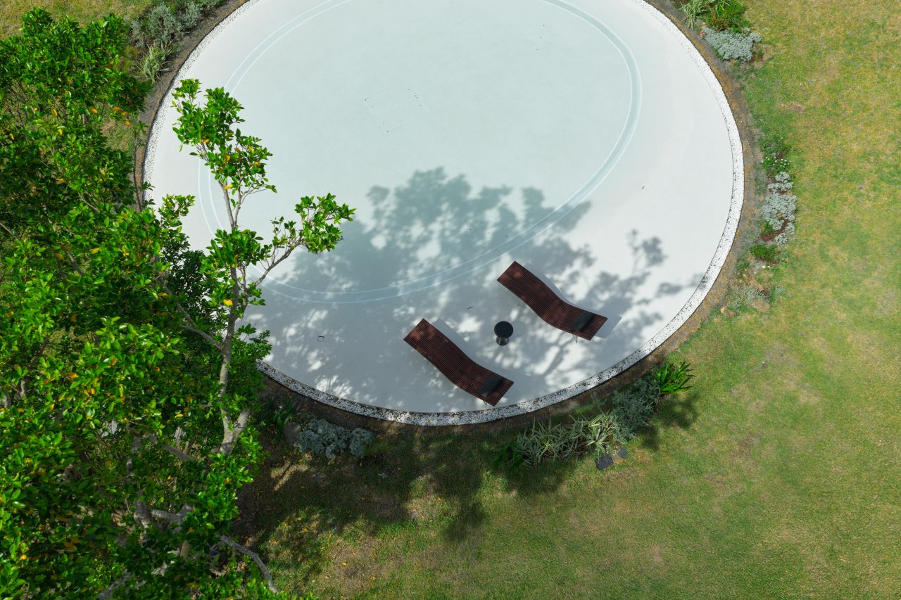 This Circular Building in Japan Features a Green Roof to Blend into its Surroundings