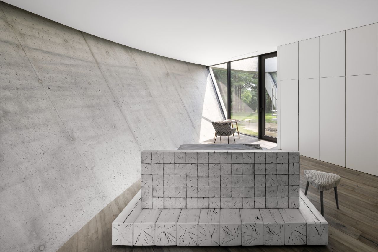This Lakeside Villa in Lithuania is Built Around Four Recessed Courtyards