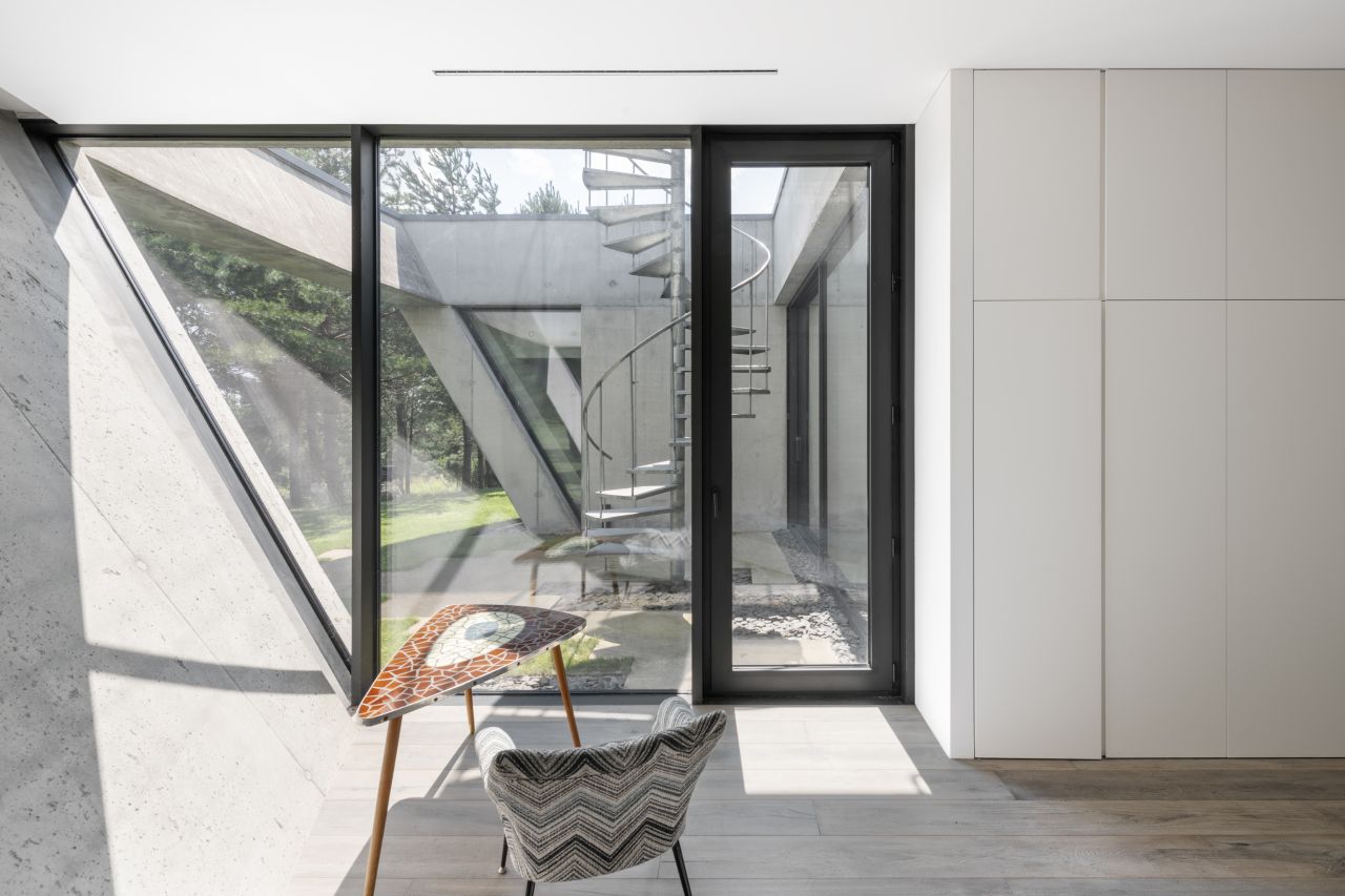 This Lakeside Villa in Lithuania is Built Around Four Recessed Courtyards