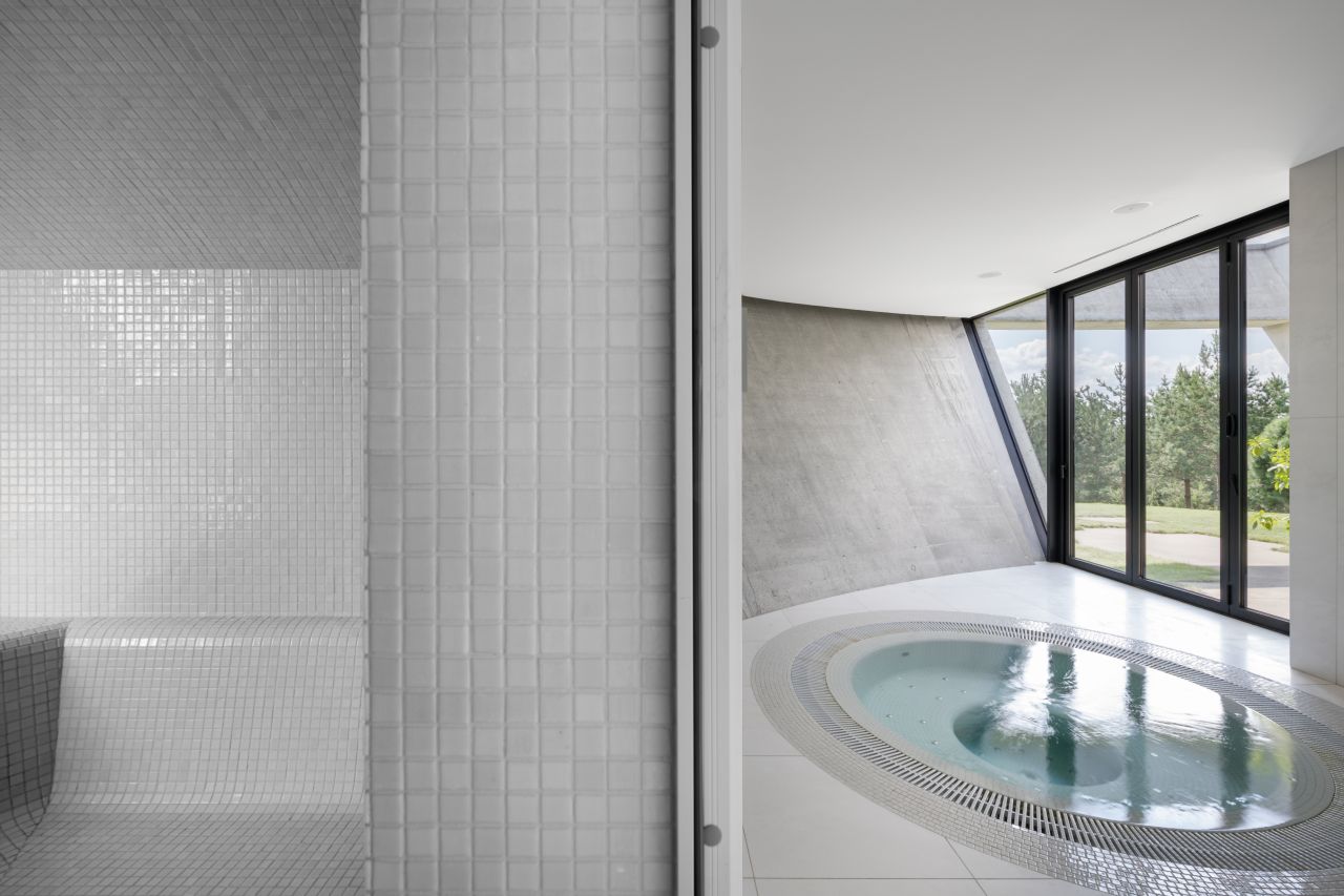This Lakeside Villa in Lithuania is Built Around Four Recessed Courtyards