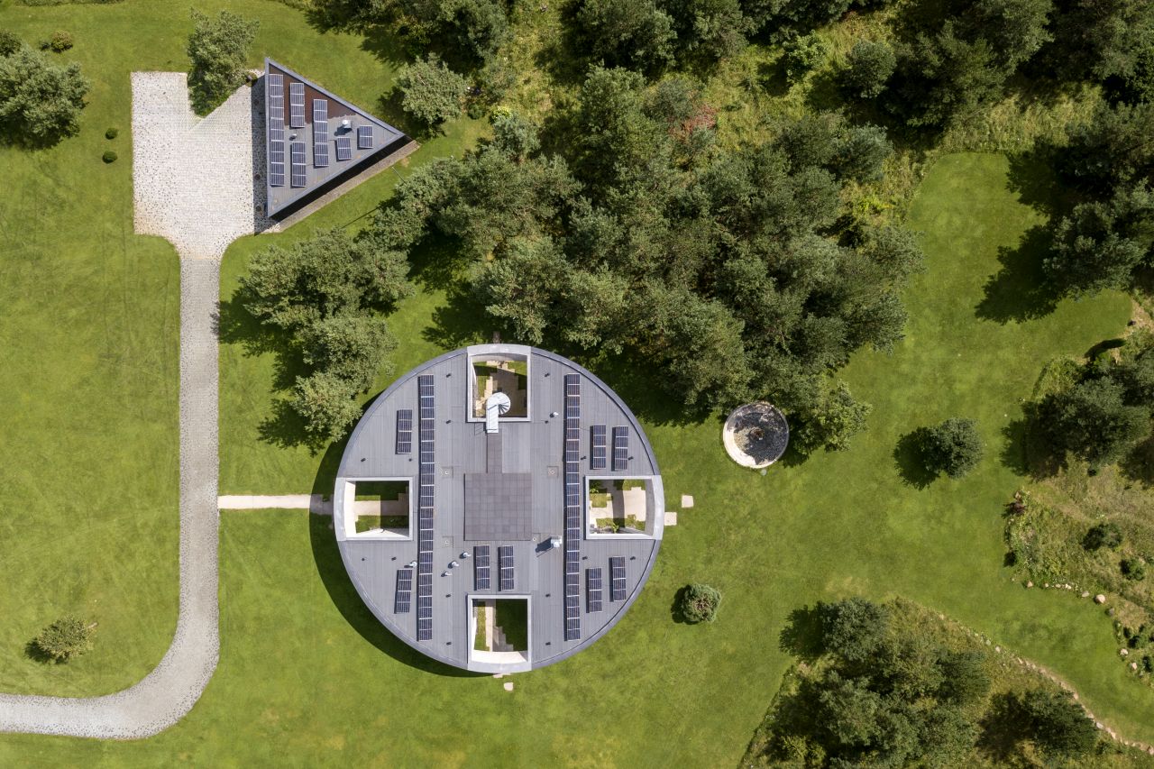 This Lakeside Villa in Lithuania is Built Around Four Recessed Courtyards
