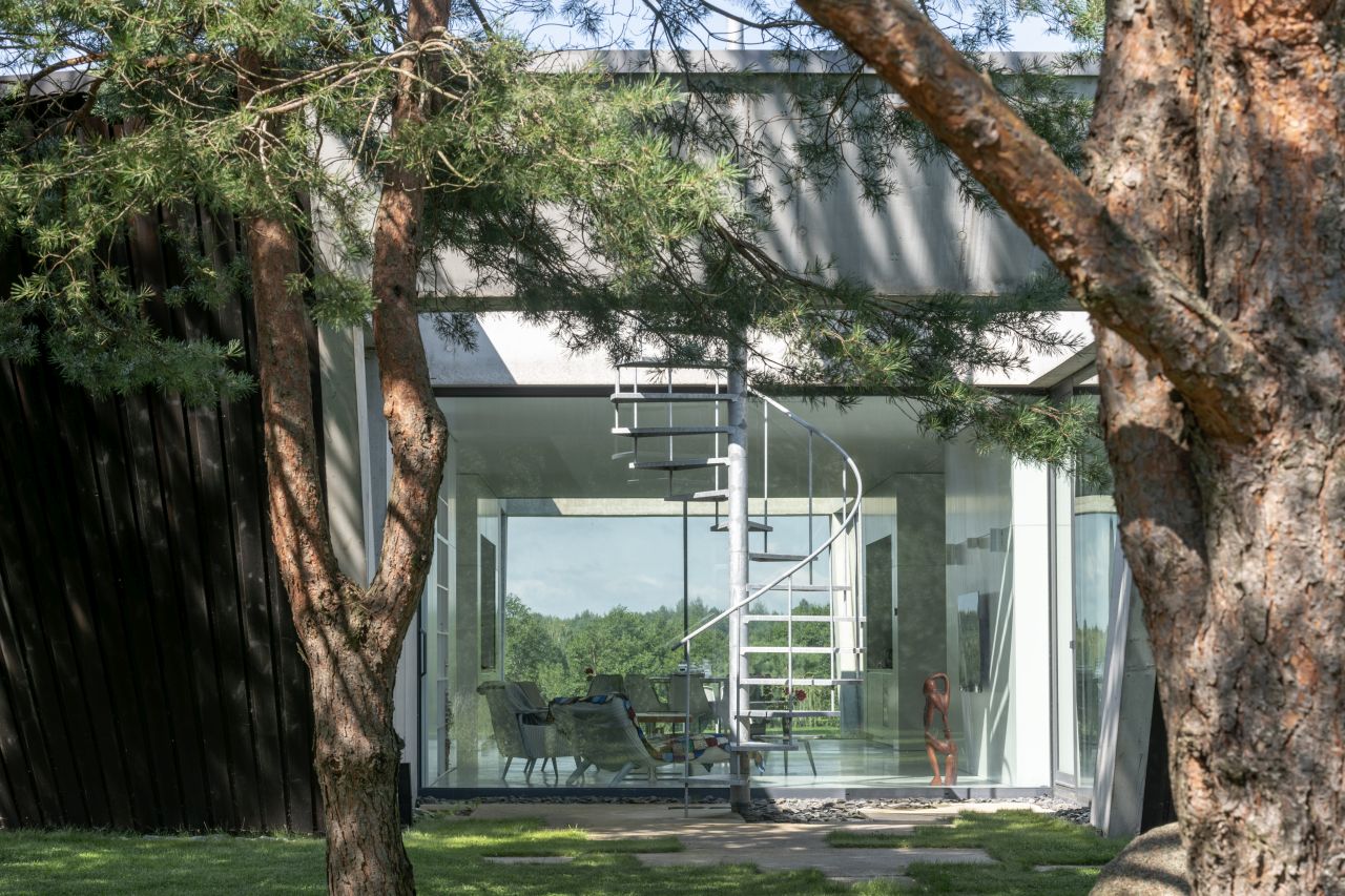 This Lakeside Villa in Lithuania is Built Around Four Recessed Courtyards