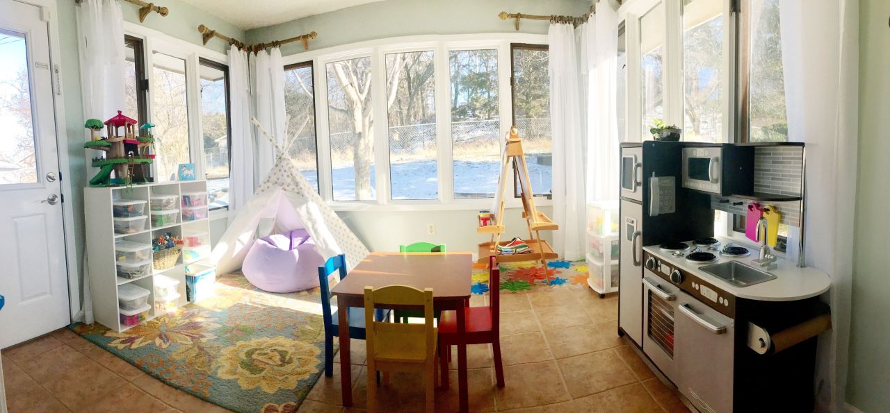 sunroom turned into a playroom for kids by Erica of Whimsical September