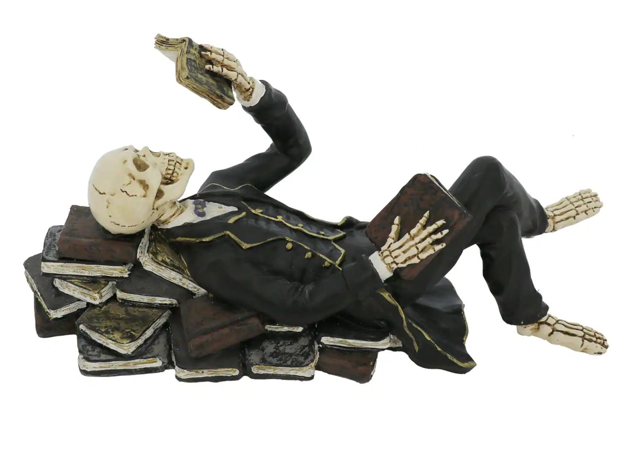 Lying Skeleton with Book Tabletop Décor - Michaels 2025 Halloween Collection