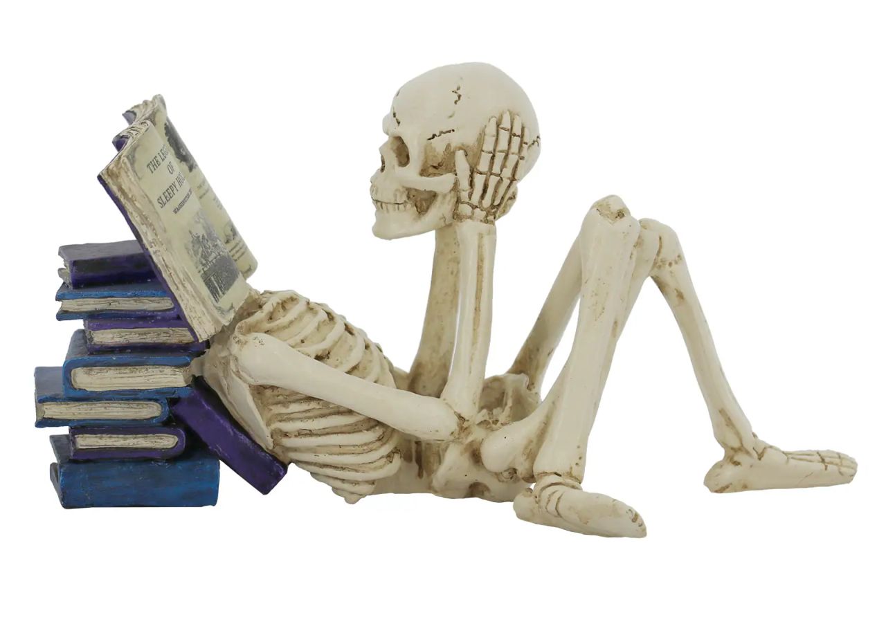 Reading Skeleton Holding Head Tabletop Figurine