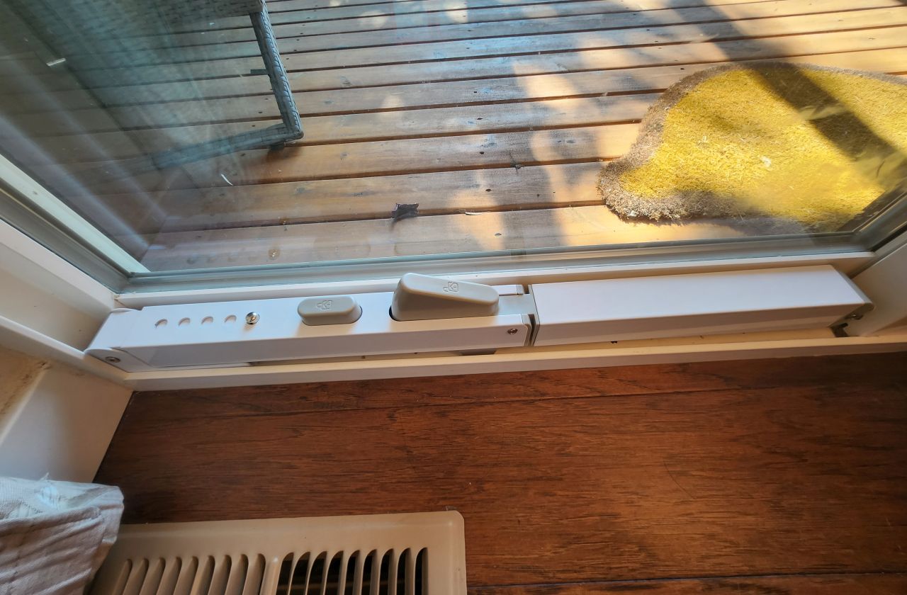 StepNLock Sliding Door Security Bar