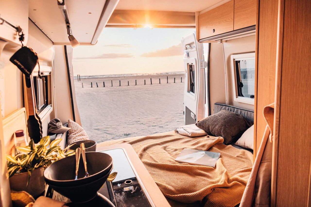 Sunlight Vanlife Camper Van with Three-Room Layout - convertible bed in the rear