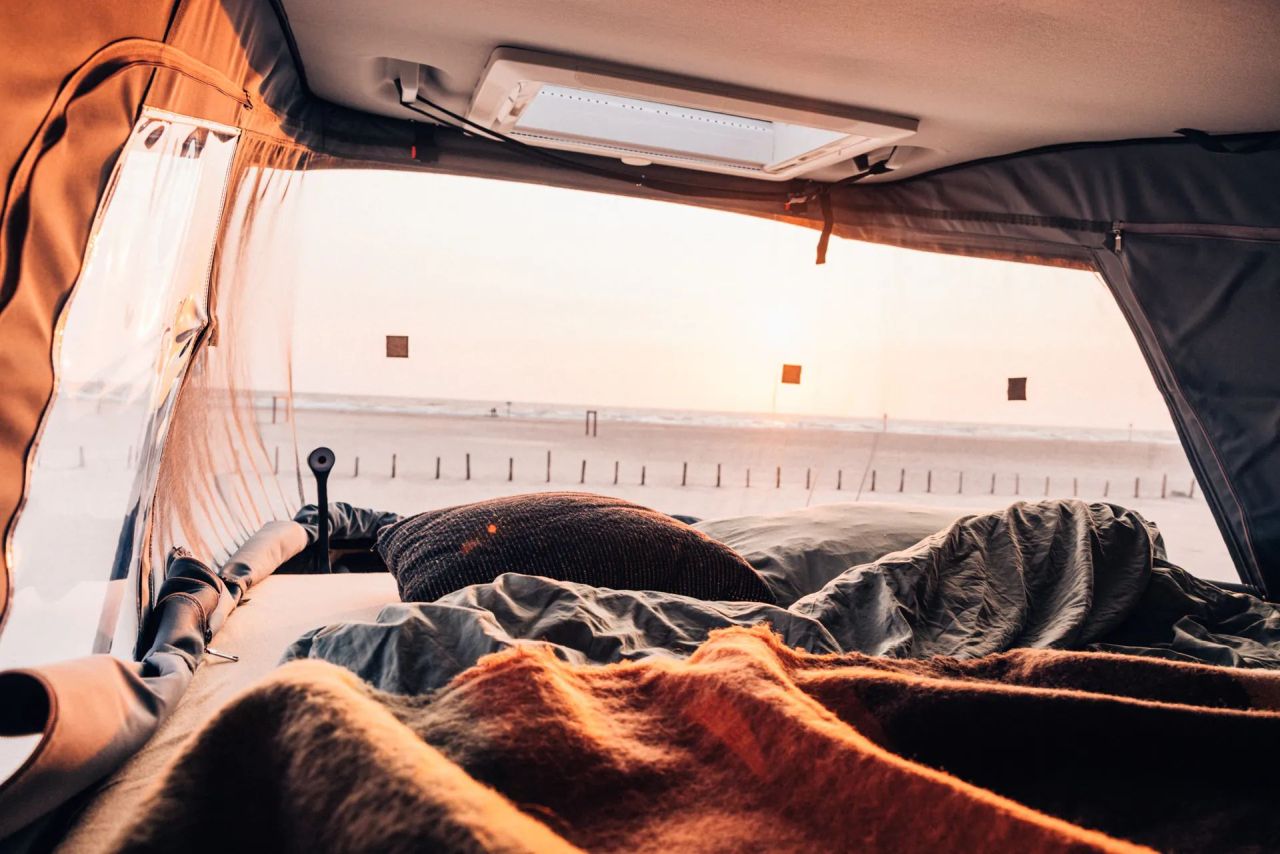 Sunlight Vanlife Camper Van with Three-Room Layout - convertible bed in the rear