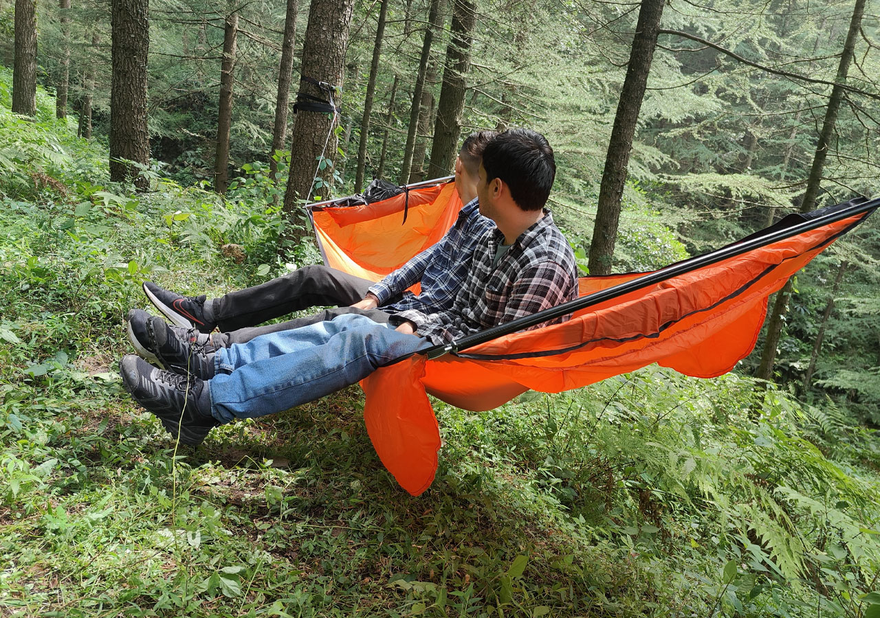 Warbonnet Ridgerunner Hammock tent hands-on review - weight capacity check by two persons sitting on it
