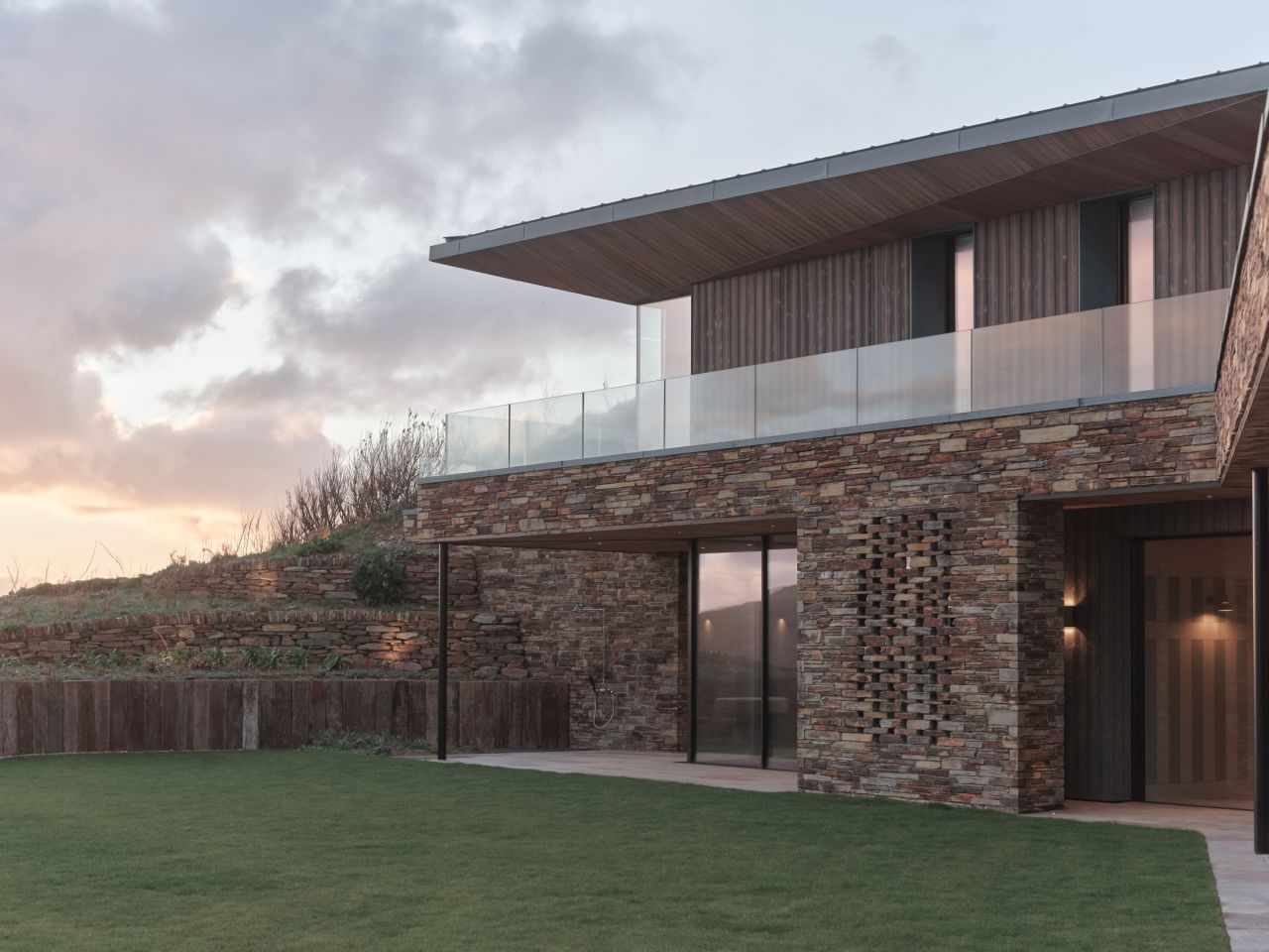 Rundell Associates Designs Two-Family House overlooking Mawgan Porth Bay in Cornwall, England