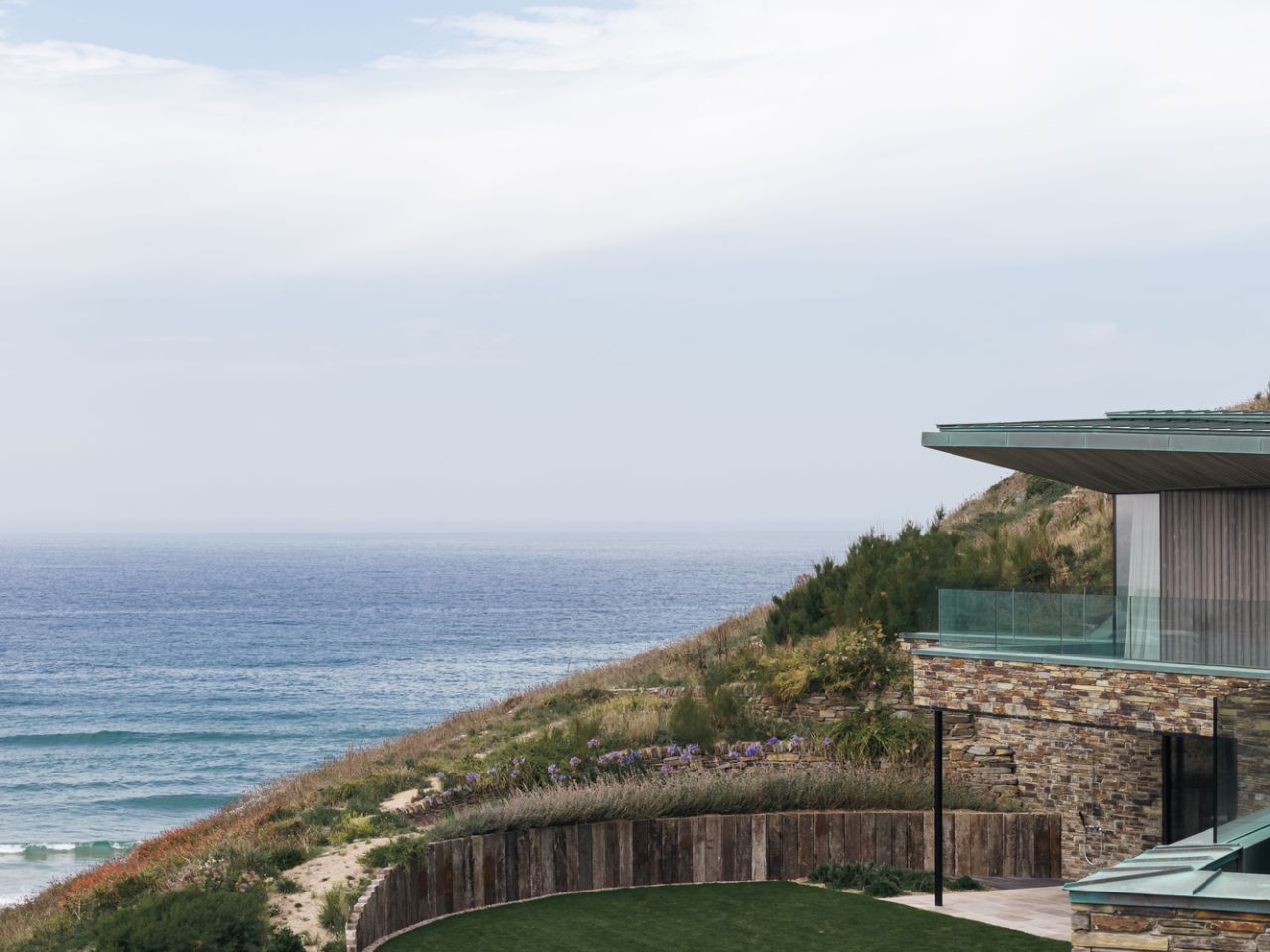 Rundell Associates Designs Two-Family House overlooking Mawgan Porth Bay in Cornwall, England