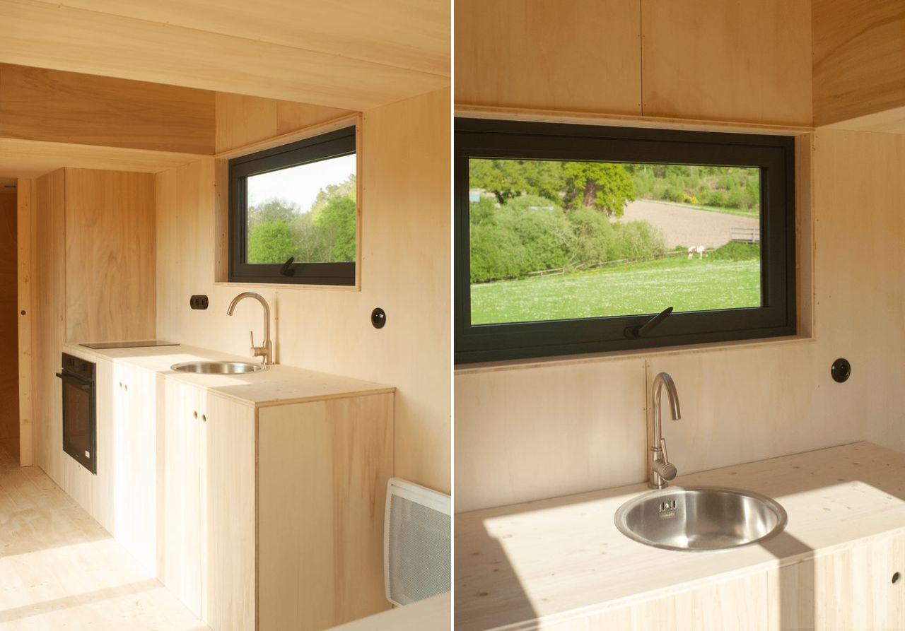 This French Tiny House on Wheels is Defined by its Porthole Windows and Vertical Silhouette