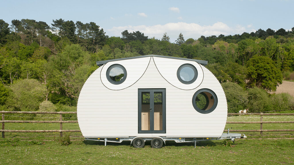 This French Tiny House on Wheels is Defined by its Porthole Windows and Vertical Silhouette