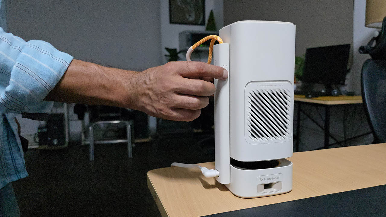 Yaber’s T1 Pro Full HD Portable Projector - pop-up button on arm