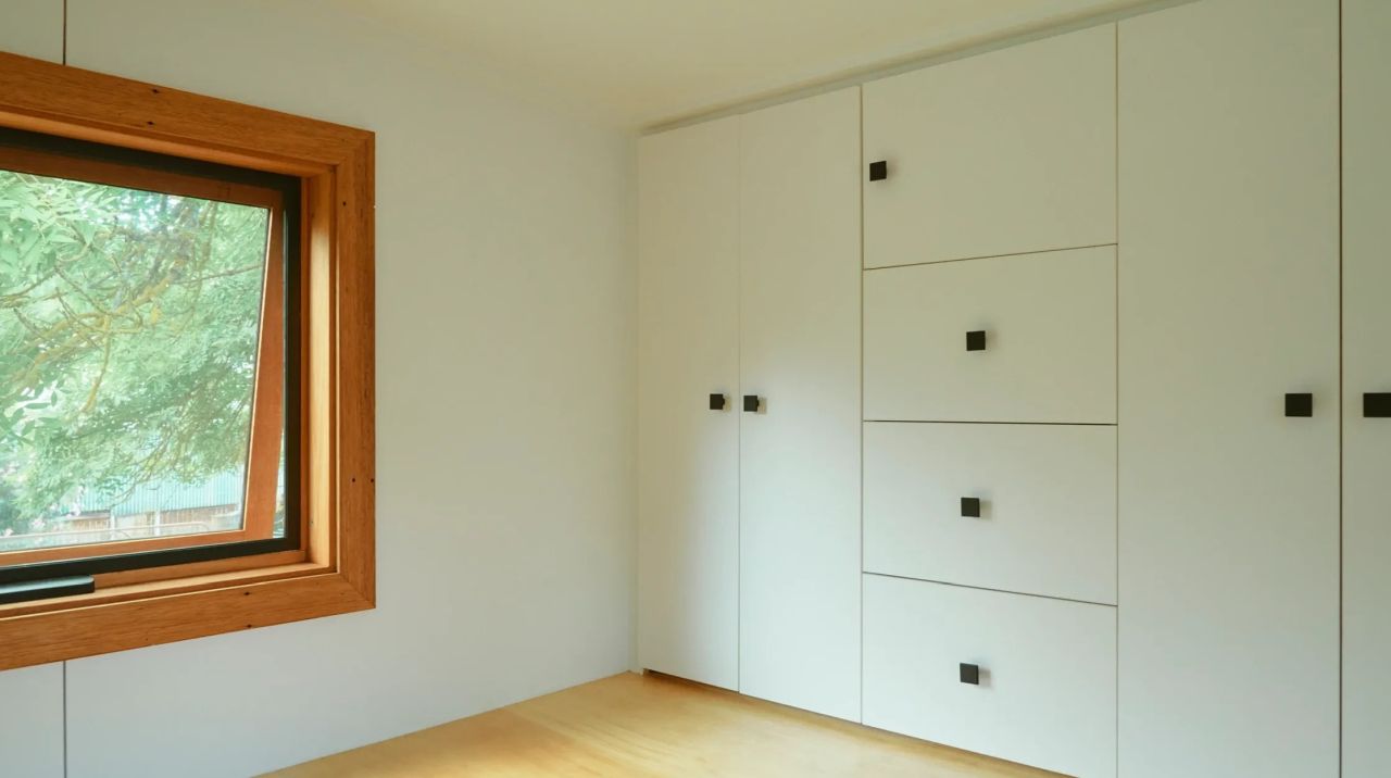 A large window makes bedroom airy and feels full of brightness.