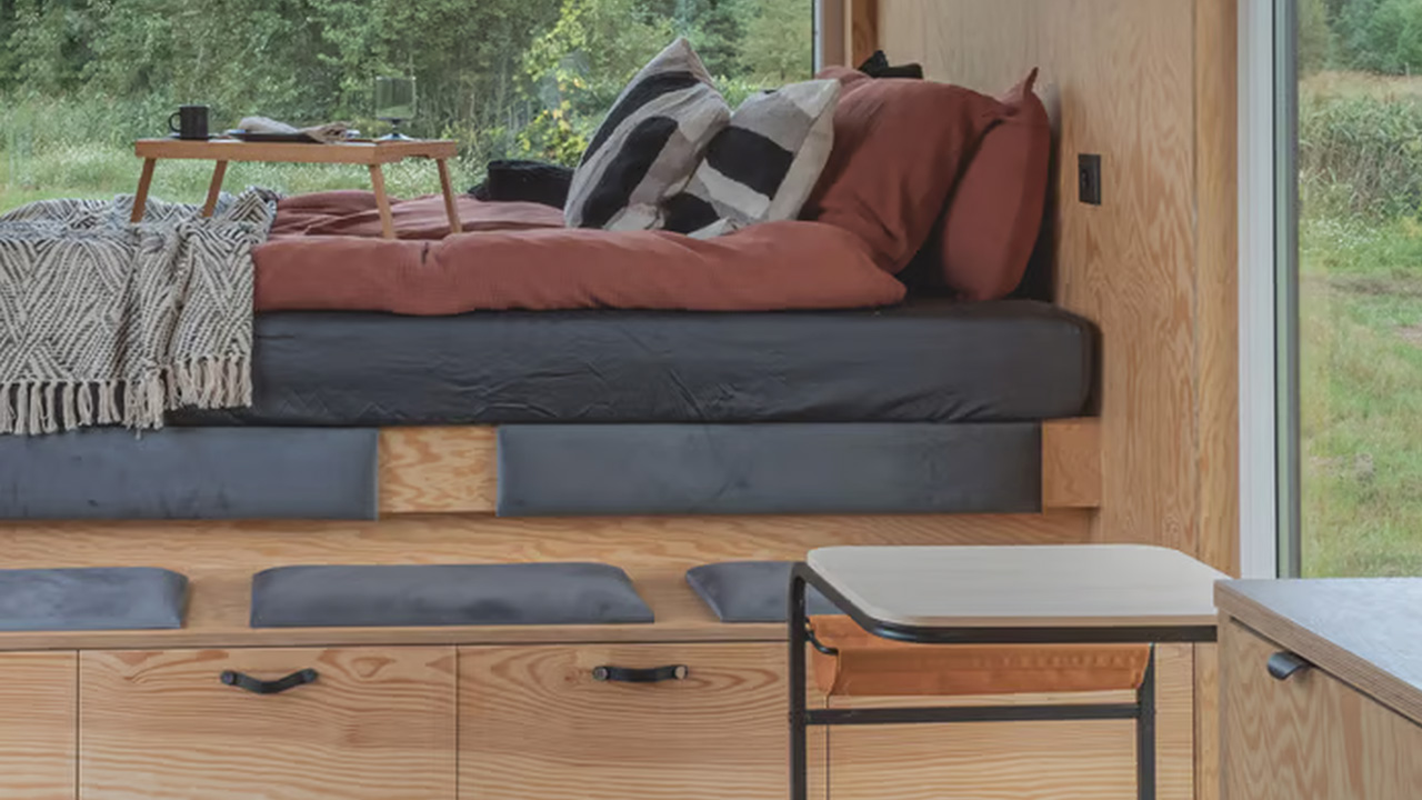 Cozy bedroom is integrated in the seating