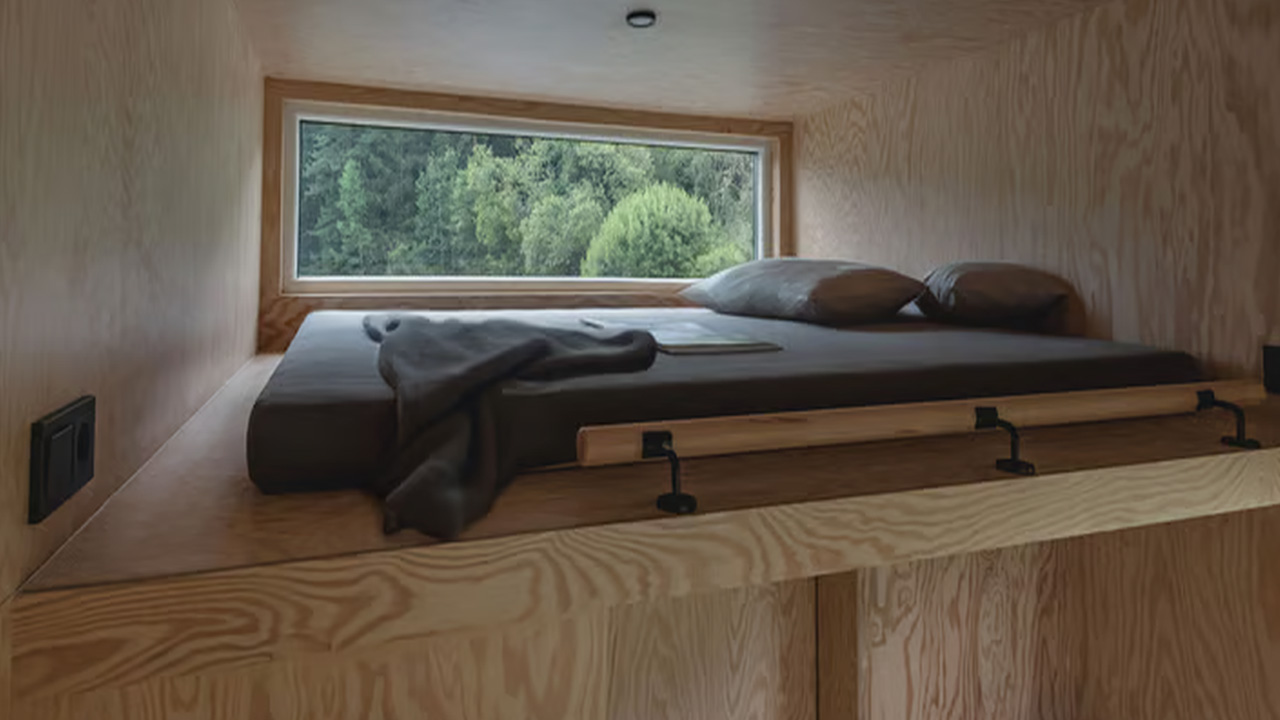 Loft Bedroom with a big window provides ample light