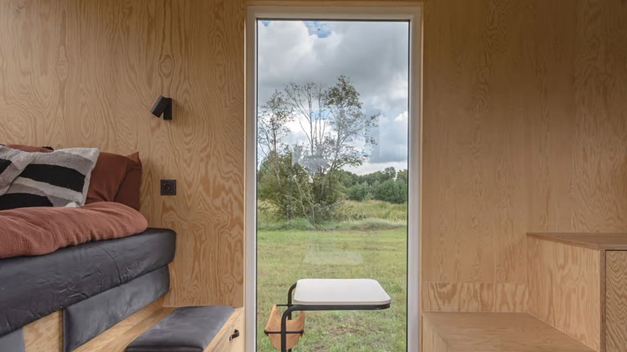 Comfy seating and a small table that can be used for dining