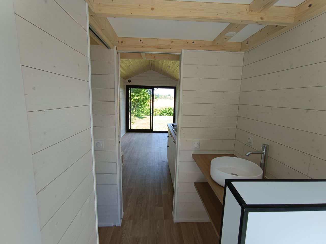 French tiny house partial wall