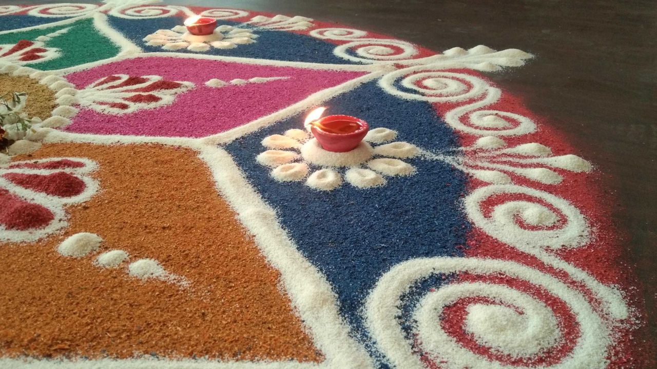 How to celebrate Diwali - make patterns with colored sand or sawdust 1