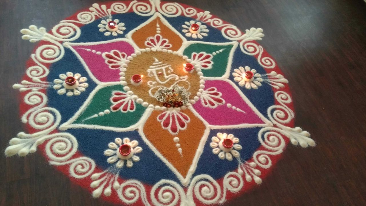 How to celebrate Diwali - make patterns with colored sand or sawdust