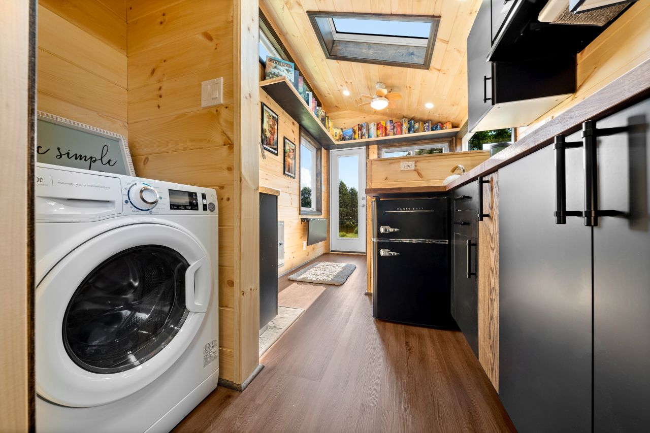 Little lodge tiny house by backcountry homes-laundry