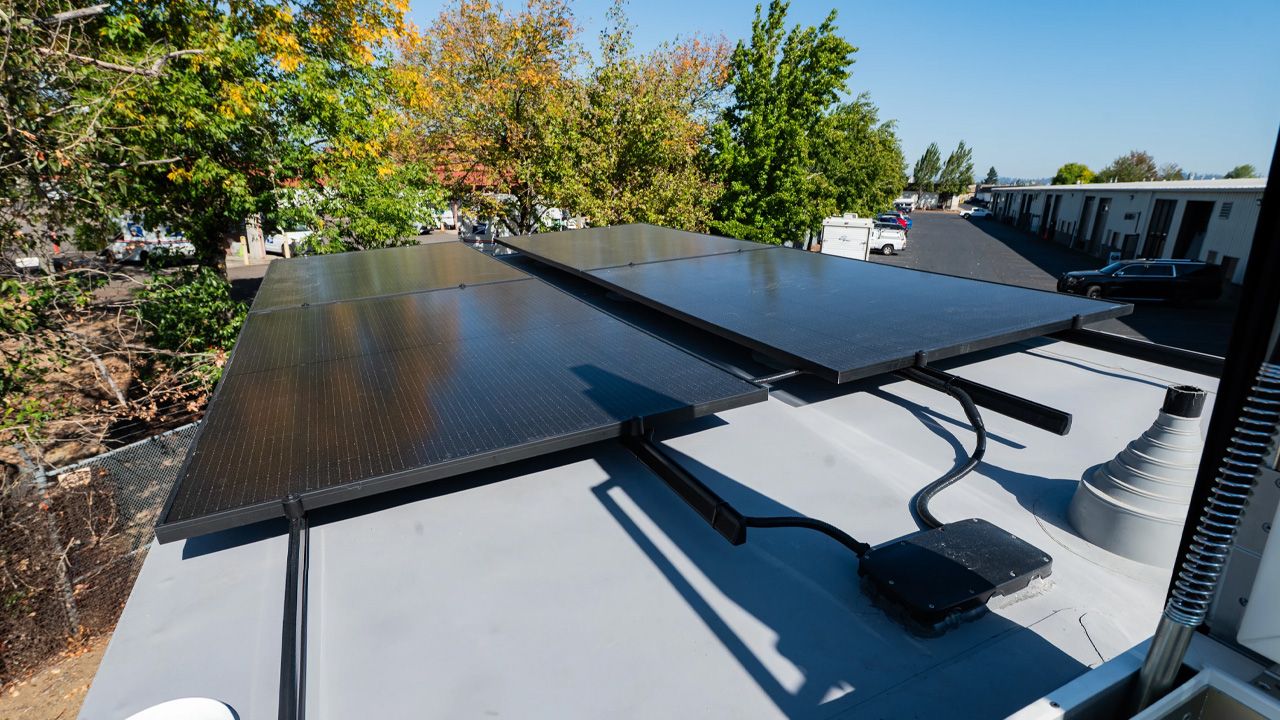 Off-Grid Gooseneck Tiny House - solar panels on the roof