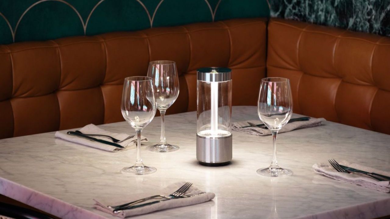 Takeout portable lamp by Burst+Punch on a table