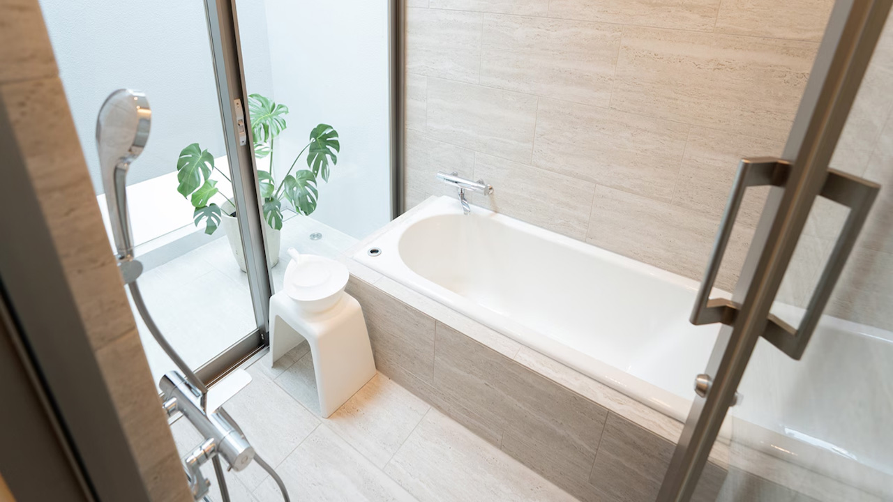 The bathroom is sleek, streamlined and elegant