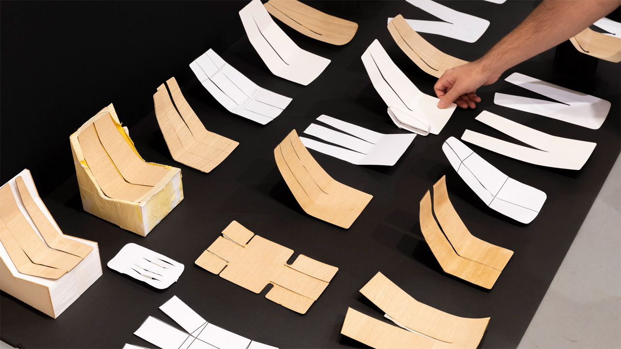 the designer of Join furniture collection shows how plywood can be bent into an inverted trouser shape