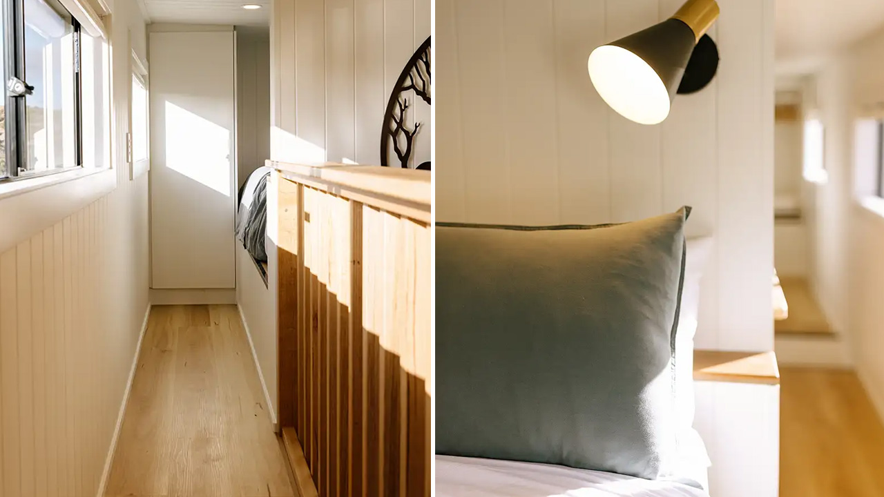 catwalk has solid railing and connects both loft bedrooms with each other